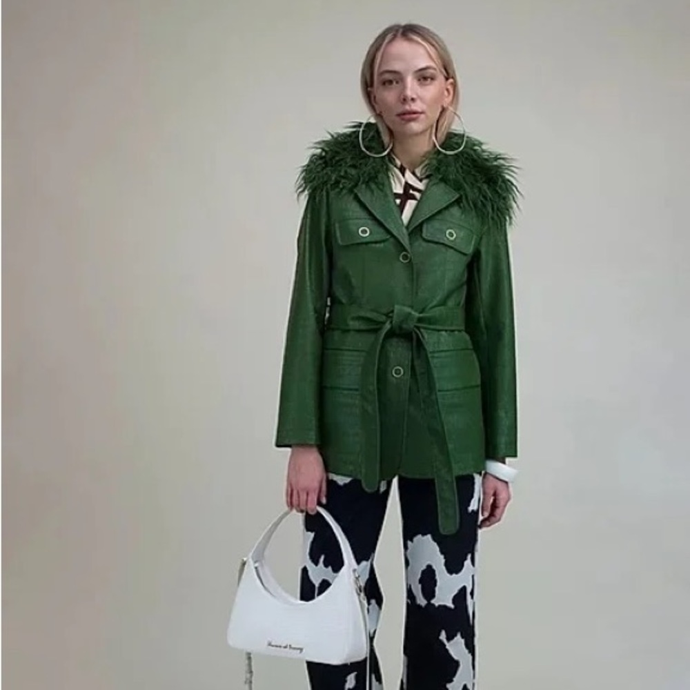 House of Sunny faux leather and faux fur jacket with metal hardware. Super cute!